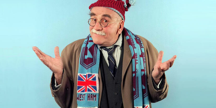 Alf Garnett in a West Ham United scarf.